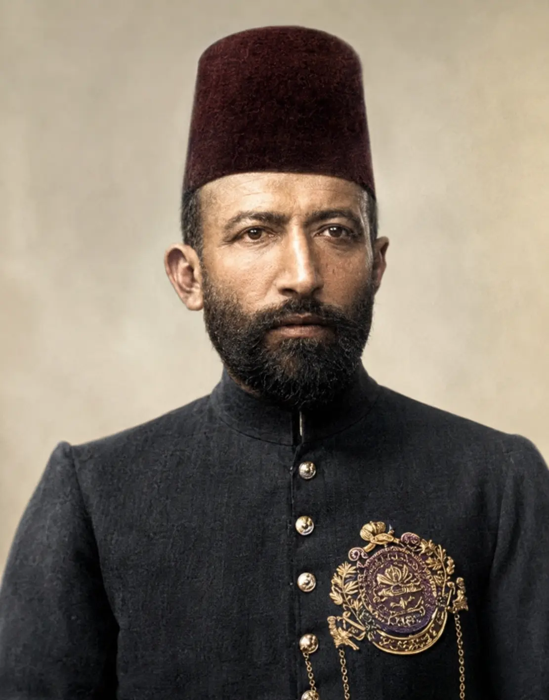AI-generated colourised impression of a bearded man in a maroon fez and dark high-collared coat bearing an ornate gold-and-purple medallion insignia, against a plain backdrop
